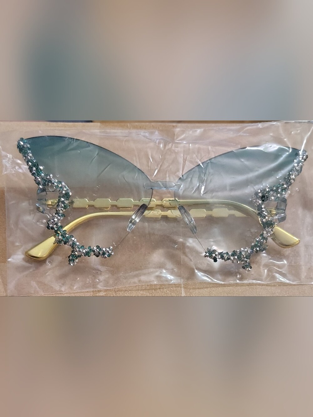 Rhinestone Accent Frameless Women's Butterfly Shaped Glasses